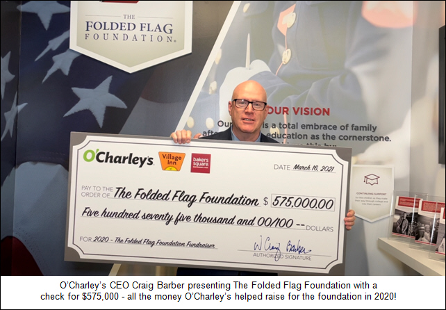 O'Charley's CEO Craig Barber presenting The Folded Flag Foundation with a check for $575,000 - all the money O'Charley's helped raise for the foundation in 2020!